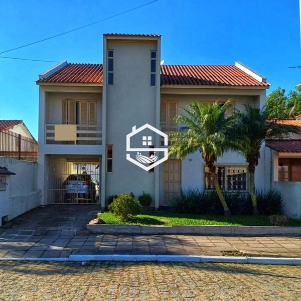 SOBRADO COM PISCINA PRÓXIMO AO CENTRO DA CIDADE.: 1ª foto da galeria de imagens do imóvel