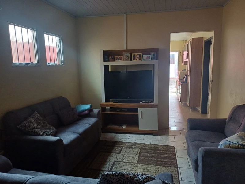 CASA 4 DORMITÓRIOS COM ÁREA GOURMET E PISCINA EM CAMAQUÃ.: 3ª foto da galeria de imagens do imóvel