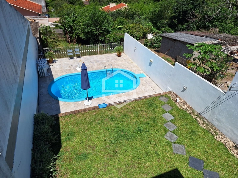 SOBRADO COM PISCINA NO CENTRO DA CIDADE...: 3ª foto da galeria de imagens do imóvel