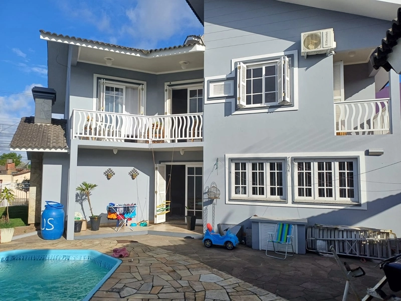 SOBRADO DIFERENCIADO COM AMBIENTES AMPLOS, PISCINA e 4 DORMITÓRIOS...: 23ª foto da galeria de imagens do imóvel