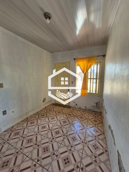 CASA 3 DORMITÓRIOS COM CHURRASQUEIRA NO BAIRRO OLARIA.: 5ª foto da galeria de imagens do imóvel